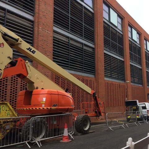 Commercial brick building cleaning by Encanto